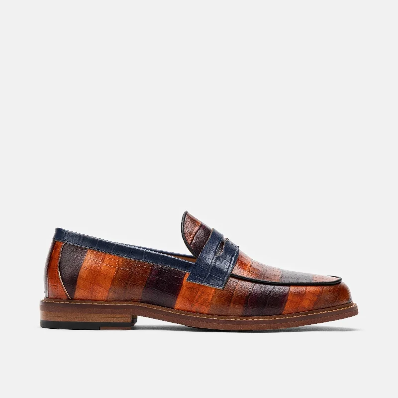 Men's loafers with a cushioned footbed Men's loafers with a perforated leather upper for ventilationCalum Badlands Leather Penny Loafers