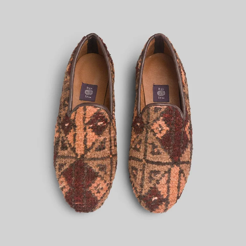 Men's loafers with a tassel front for a classic look Men's loafers with a stretchy side panel for a better fitMen's Kilim Loafer Size 10