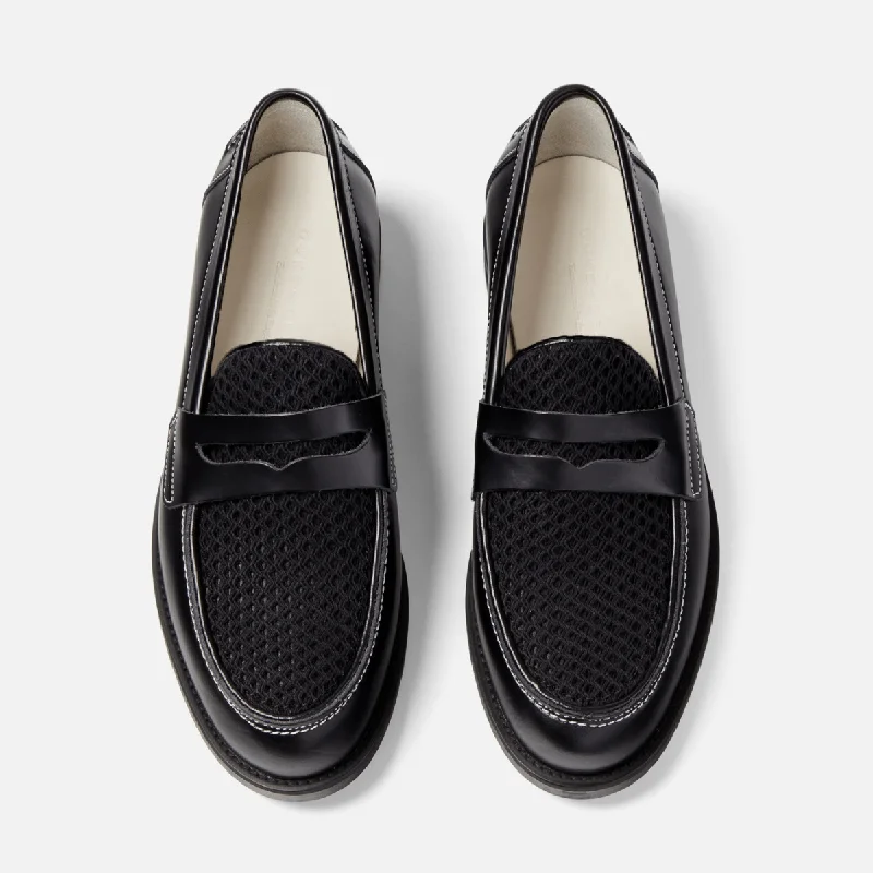 Men's loafers with a stretchy side panel for a better fitWilde Black Rattan Penny Loafer - Men's