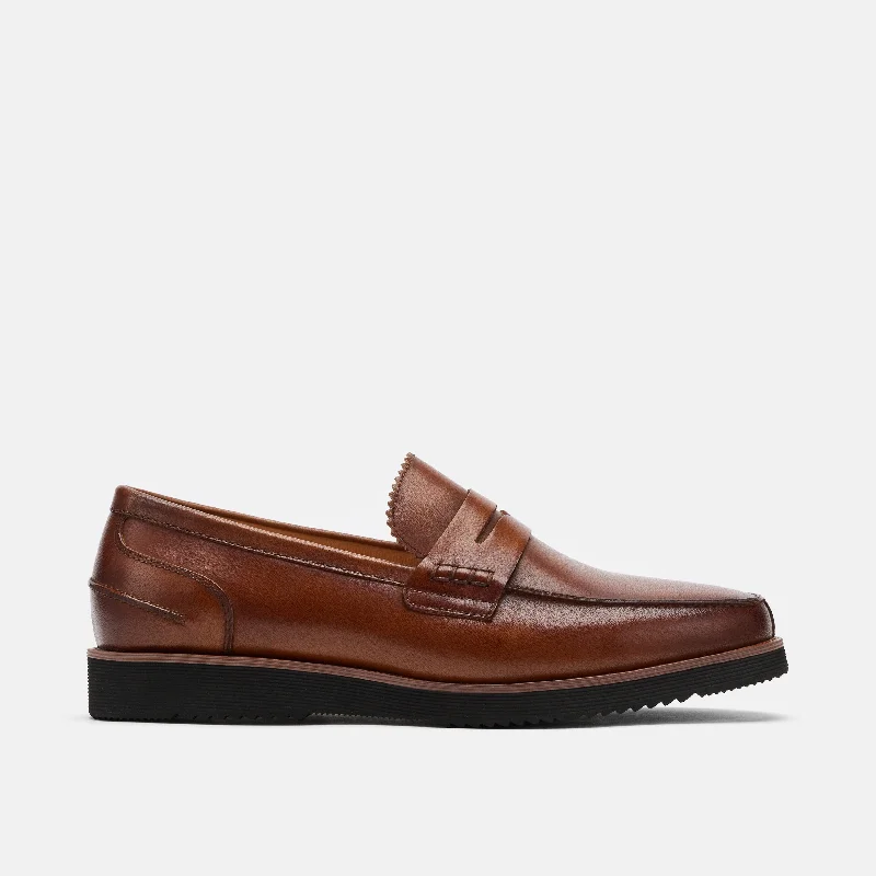 Men's loafers with a cushioned footbed Men's loafers with a perforated leather upper for ventilationAbe Mahogany Leather Penny Loafers