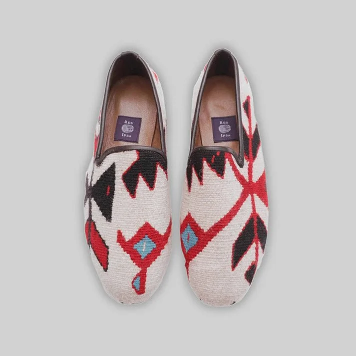 Men's loafers with a smooth leather finish Men's loafers with a rubber sole for durabilityMen's Kilim Loafer Size 8