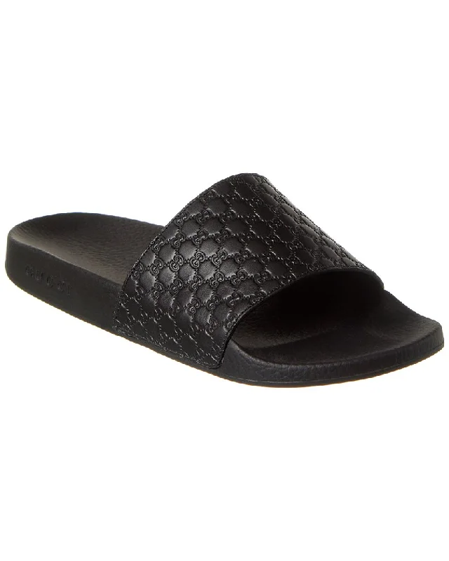 Men's sandals with a decorative buckle or charmGucci Microguccissima Leather Slide